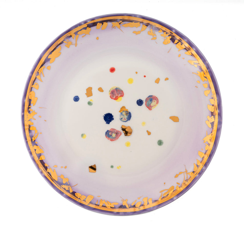 Gold-splattered circular art plate